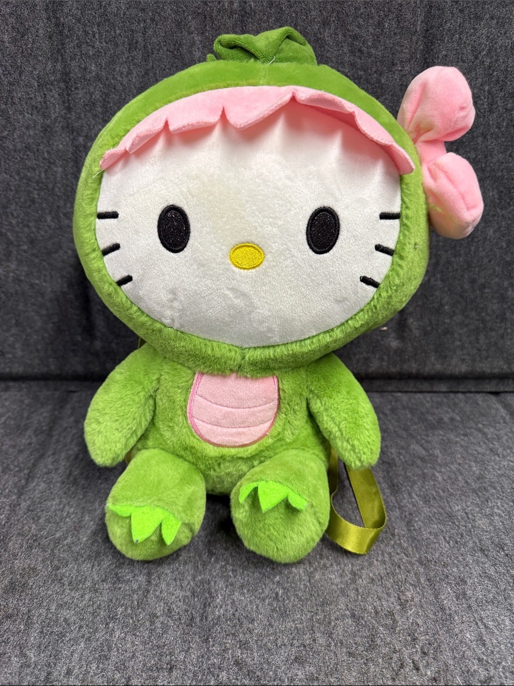 Sanrio Hello Kitty Plush in Green Dino Outfit with Pink Trim